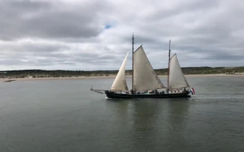 Stock Video Large Boat Sailing By An Island Animated Wallpaper