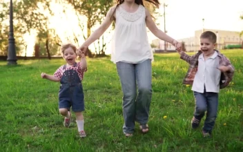 Stock Video Mother Running With Her Childre Animated Wallpaper