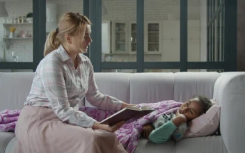 Stock Video Mother Reads A Book To Her Sick Daughte Animated Wallpaper