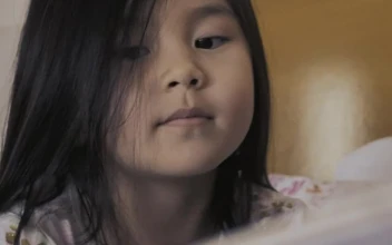 Stock Video Mother Reading A Story To Her Daughter To Go T Animated Wallpaper