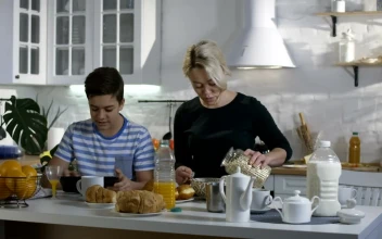 Stock Video Mother Preparing Breakfast For His So Animated Wallpaper
