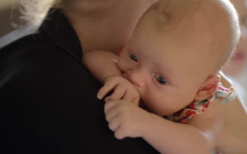 Stock Video Mother Holding Her Quiet Bab Animated Wallpaper