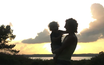 Stock Video Mother Holding Her Bab Animated Wallpaper