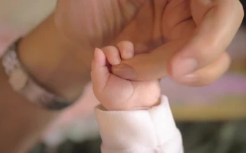 Stock Video Mother Holding Hands With Her Bab Animated Wallpaper