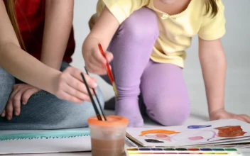 Stock Video Mother Helps To Paint Her Daughter With Watercolo Animated Wallpaper