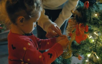 Stock Video Mother Helping Her Daughter To Put A Sphere To Th Animated Wallpaper