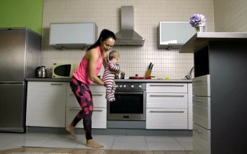 Stock Video Mother Doing Push Ups In Home With Her Bab Animated Wallpaper