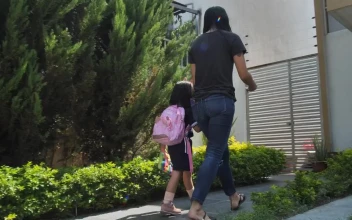 Stock Video Mother Coming Home After Picking Up Her Daughter From Schoo Animated Wallpaper