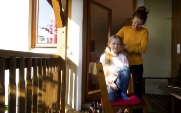 Stock Video Mother Brushing Her Daughters Hai Animated Wallpaper