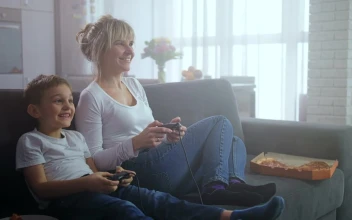 Stock Video Mother And Son Playing Video Games Togethe Animated Wallpaper