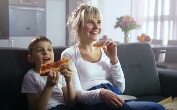 Stock Video Mother And Son Eating Pizz Animated Wallpaper