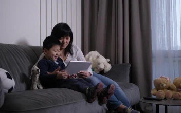 Stock Video Mother And Her Son Viewing A Table Animated Wallpaper