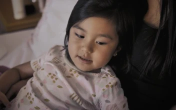 Stock Video Mother And Her Daughter Reading Before Going To Slee Animated Wallpaper