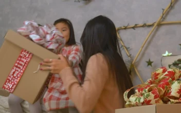 Stock Video Mother And Daughters Opening Presents On Christmas Da Animated Wallpaper