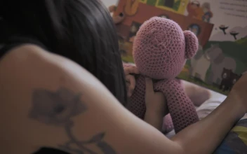 Stock Video Mother And Daughter Reading A Childrens Book Back Vie Animated Wallpaper