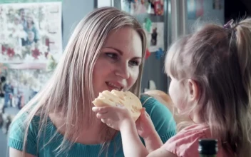 Stock Video Mother And Daughter Hug In The Kitche Animated Wallpaper