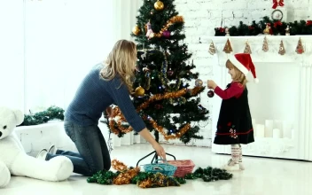 Stock Video Mother And Daughter Decorating The Christmas Tre Animated Wallpaper