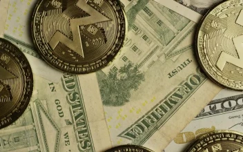 Stock Video Monero Cryptocurrency Coins Over Dollar Bill Animated Wallpaper