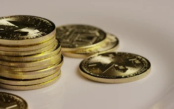 Stock Video Monero Coins Rotating On A White Surfac Animated Wallpaper