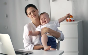 Stock Video Mom Tries To Work From Home Taking Care Of Animated Wallpaper