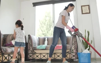 Stock Video Mom And Daughter With Vacuum Cleaners Cleaning A Roo Animated Wallpaper