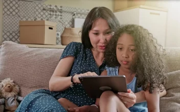 Stock Video Mom And Daughter Spending Time Together With A Table Animated Wallpaper