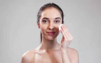 Stock Video Model Demonstrates Acne Skin Care Routin Animated Wallpaper