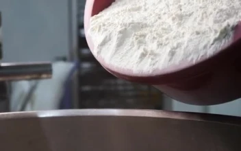 Stock Video Mixing Flour In A Large Bowl Sma Animated Wallpaper