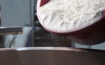 Stock Video Mixing Flour In A Large Bow Animated Wallpaper