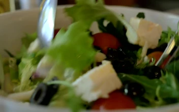 Stock Video Mixing A Salad Ready For Serving Guest Animated Wallpaper