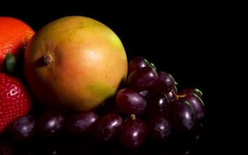 Stock Video Mixed Fruit On A Dark Tabl Animated Wallpaper