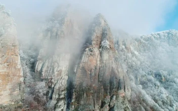Stock Video Mist Covering A Snow Topped Mountai Animated Wallpaper