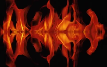 Stock Video Mirror Effect Of Flames Burning On A Black Backgroun Animated Wallpaper
