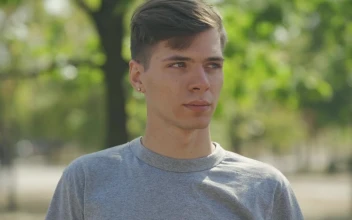 Stock Video Millennial Man Smiles At Camera In Outdoor Portrai Animated Wallpaper