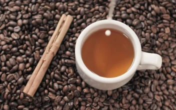 Stock Video Milk Being Poured Into A Coffee Cu Animated Wallpaper