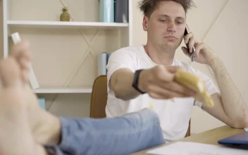 Stock Video Messy Guy Eating Pizza And Talking On Mobile Phon Animated Wallpaper