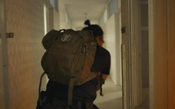 Stock Video Mercenary Looking For Zombies In An Abandoned Buildin Animated Wallpaper