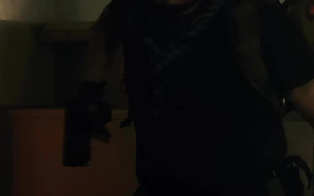 Stock Video Mercenary Draws His Gun In An Abandoned Hospita Animated Wallpaper