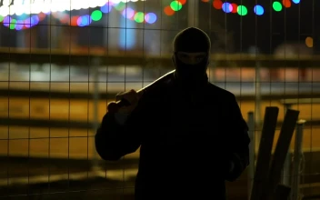 Stock Video Menacing Man With A Baseball Bat At Nigh Animated Wallpaper