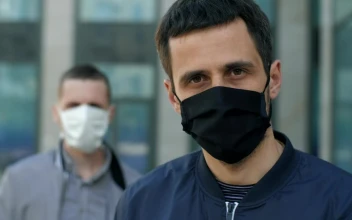 Stock Video Men With Face Masks On The Street Portrai Animated Wallpaper