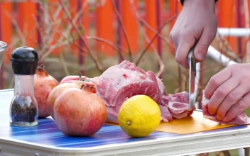Stock Video Men Slicing Meat For Bb Animated Wallpaper