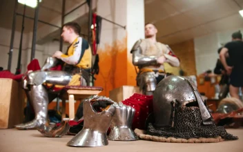 Stock Video Men In The Dressing Room Taking Off The Armo Animated Wallpaper