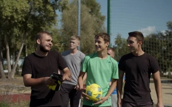 Stock Video Men Coming To Play Soccer Footbal Animated Wallpaper