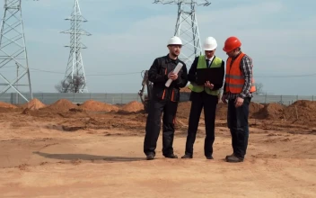 Stock Video Men Checking Project At The Construction Sit Animated Wallpaper