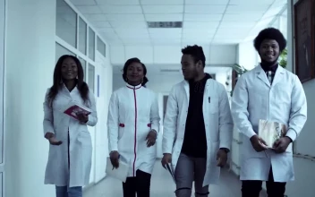 Stock Video Medical Students Walking Through The Corrido Animated Wallpaper