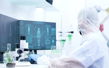 Stock Video Medical Scientist Types And Looks At Human Body Sca Animated Wallpaper