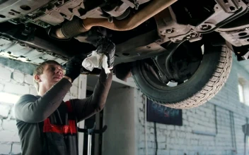 Stock Video Mechanic Working In The Bottom Of A Ca Animated Wallpaper
