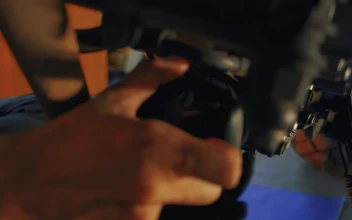Stock Video Mechanic Maintaining A Motorcycle Engin Animated Wallpaper