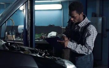 Stock Video Mechanic Checking A Car Moto Animated Wallpaper