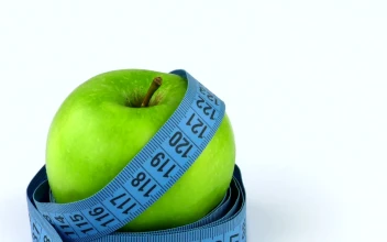 Stock Video Measuring Tape Around An Appl Animated Wallpaper
